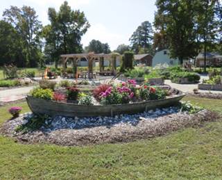 Poquoson Learning Garden boat with flowers